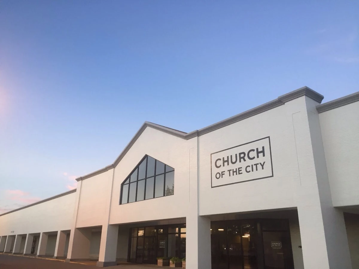 Church of the City Spring Hill — exterior with warm evening light