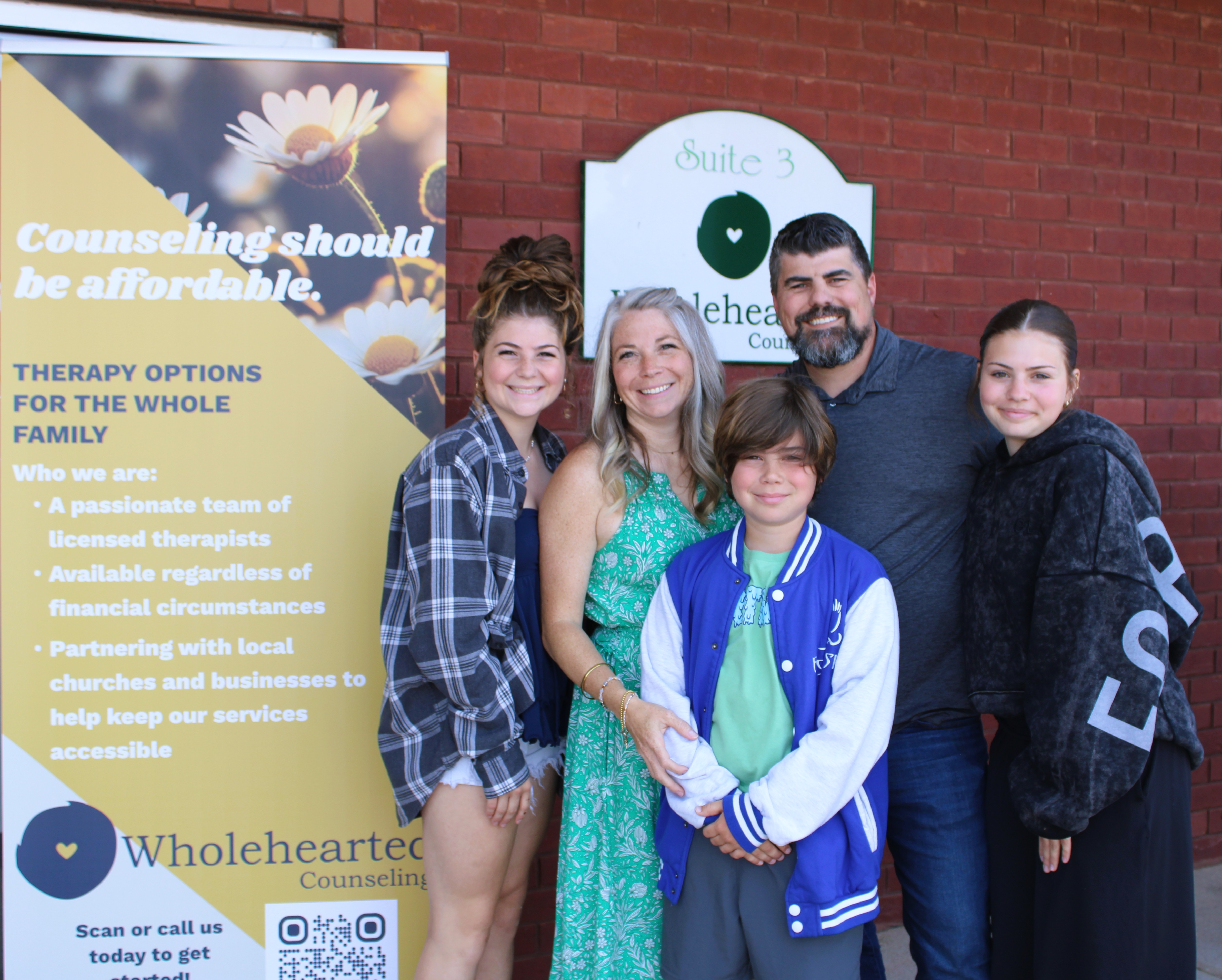 The Day family outside the Wholehearted Counseling office