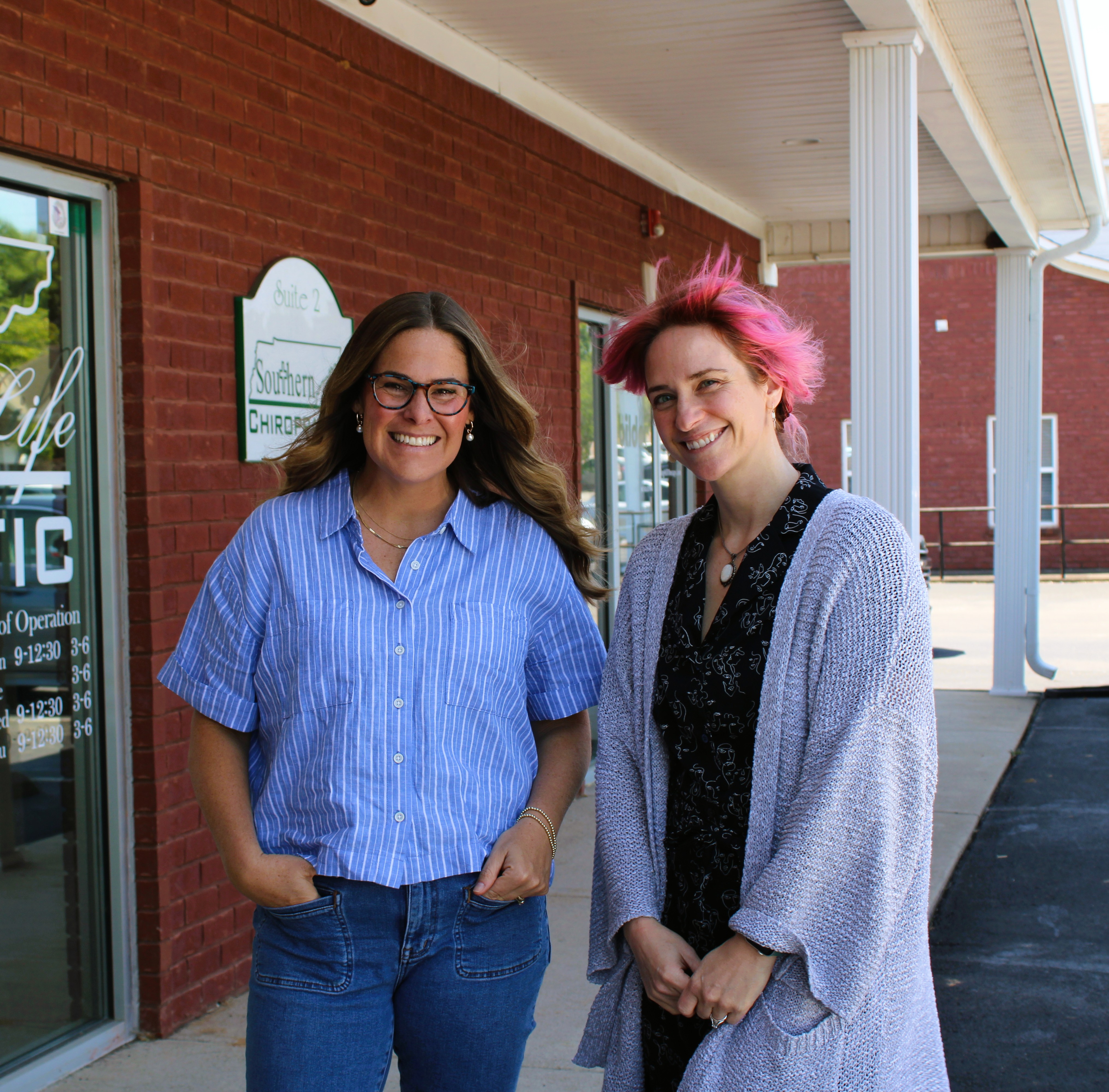 Two Wholehearted Counseling therapists outside the Spring Hill office